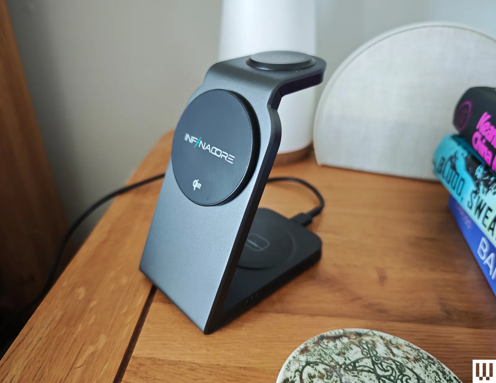 Infinacore T3 Pro a black angular charging stand
